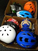 Two boxes of as new children's & adult cycle helmets