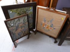 Parcel of five vintage embroidery decorated fire screens