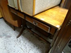 A reproduction walnut two-drawer drop end sofa table