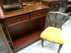 A modern dark wood bookcase with two drawers together with an antique upholstered seated dining