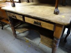 A vintage oak two-drawer wash stand with lower shelf