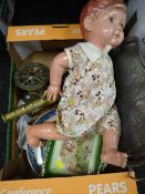 Brass cannon, flatware, vintage doll wearing Mickey Mouse patterned dress etc