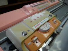 A Singer Magic Memory knitting machine