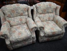 A pair of Lazy Boy reclining armchairs in a floral upholstery