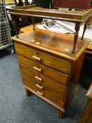 A vintage small five-door chest together with an oak bed tray
