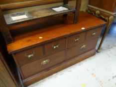 A modern lightwood low four-drawer hi-fi cabinet