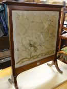 A good Edwardian mahogany & string decorated fire screen with silk decorated panel of Oriental