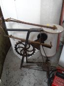 A cast metal mechanical treadle system
