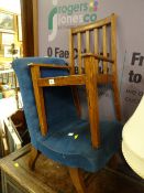 A small upholstered child's chair together with an oak splat back child's chair