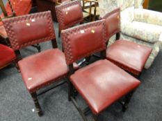 A set of four vintage leatherette & studded dining chairs