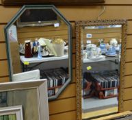A modern carved gilt framed hall mirror together with another