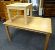 A modern light oak dining table together with a beech glass top square occasional table