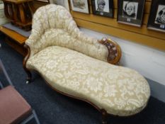 An antique walnut & upholstered chaise longue