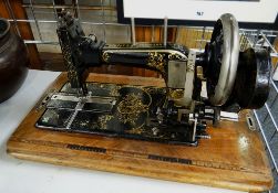 A cased Frister & Hossmann, Berlin sewing machine