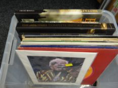 A box of mainly The Times reference books, quantity of mainly jazz LP records