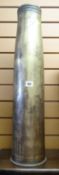 A large brass shell case