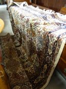 A blue & cream ground Persian rug