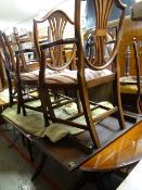 Modern reproduction mahogany extending dining table together with six (2+4) wheat sheaf shield