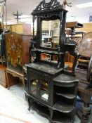 An early twentieth century ebonised two-door cabinet with a shelved & mirrored top