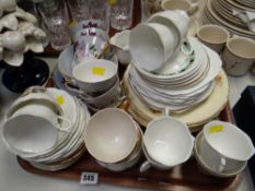 Tray of various patterned teaware