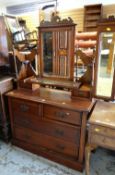 An Edwardian mahogany three-mirrored dressing table