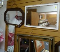 A vintage oak framed mirror together with two others