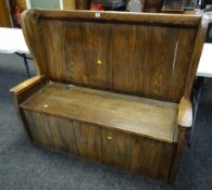 A good oak settle with box seat
