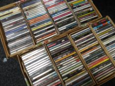 Two boxes of CDs, approximately 200