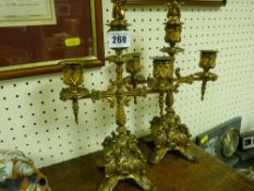 Pair of heavy brass candelabra