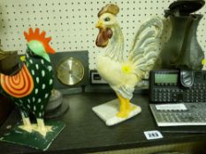 Pair of metal cockerels, slate items, pewter ware etc