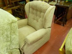 Terracotta coloured manual recliner chair