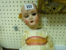German made porcelain headed vintage doll with dress
