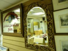 Filigree gilt framed bevelled wall mirror