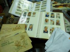 Collection of cigarette cards, both loose quantities and various albums