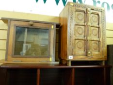 Rustic carved front small two door cupboard and a hanging single door wall rack