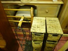 Ironwork wine holder, iron and rush narrow sets of drawers and a towel airer