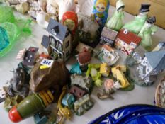 Collection of miniature houses, pair of pottery bookends, two Russian doll boxes etc