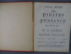 Vocal Score music book for the Pirates of Penzance by Gilbert & Sullivan, signed to the interior