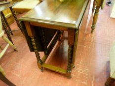 Reproduction mahogany gate leg table on barley twist supports