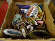 Collection of boat shaped ornaments and holders in various materials