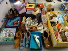 Large quantity of ornamental collectable shoes
