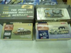 Four boxed Corgi World War II collection diecast vehicles and tanks