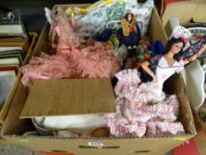 Box of collectable dolls and equipment