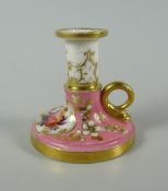 A RARE NANTGARW PORCELAIN TAPERSTICK of circular form with loop handle of serpent-form and with