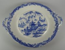 A SWANSEA POTTERY 'WHAMPOA' PATTERN TRANSFER STAND of circular form with twin loop handles, 39cms