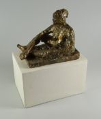 PAUL REES composition on wooden plinth - reclining figure, 28cms high