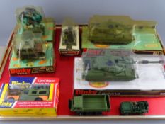 Dinky Toys - five blister pack army vehicles, two Chieftain Tanks 683, a Daimler armoured car 676