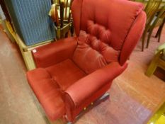 Red button backed upholstered chair