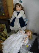 Two modern porcelain headed collector's dolls