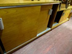 Modern split level sideboard with twin sliding doors on both sides